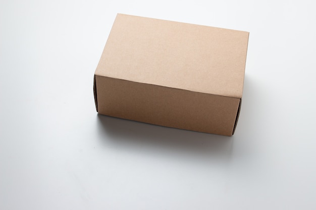 Cardboard Box or brown paper box on white background