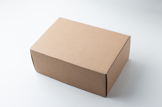 Cardboard Box or brown paper box on white background