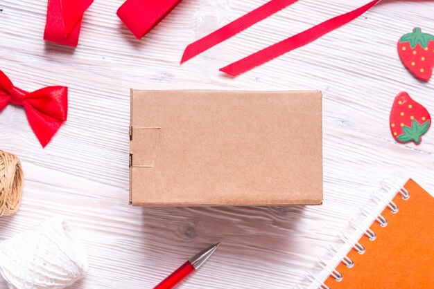 Cardboard box on wooden table