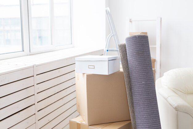 Cardboard boxes and carpet - moving to a new house