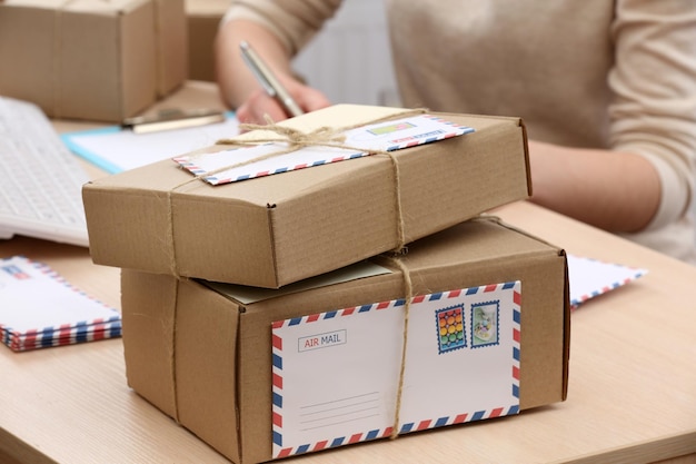 Cardboard boxes on work place in post office