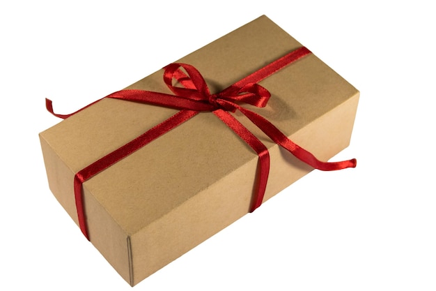 Cardboard gift box with red ribbon on isolated white background