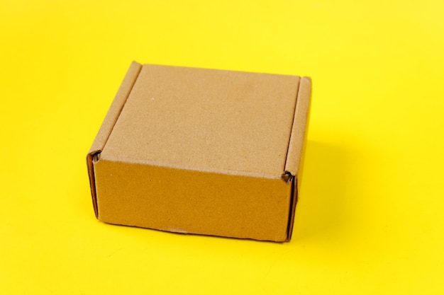 Cardboard isolated on a yellow background