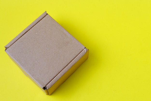 Cardboard isolated on a yellow background