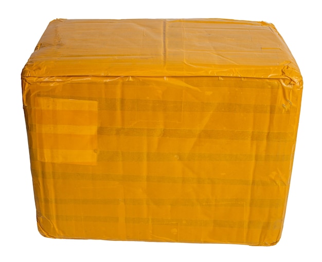 Cardboard parcel box whole wrapped with yellow sticky tape isolated on white background