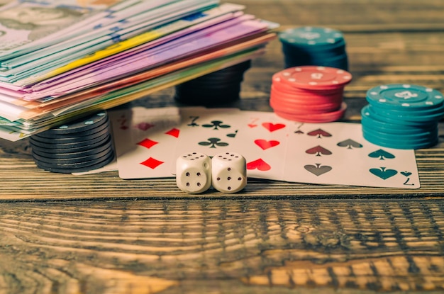 Photo cards with dice and money on the table.