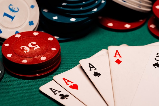 Cards with a square of aces in poker 