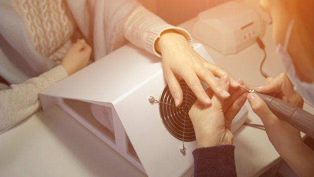 Care of hands and nails. Preparing for the procedure of manicure, sunlight.