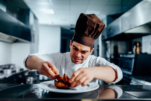 Carefully plating the meal