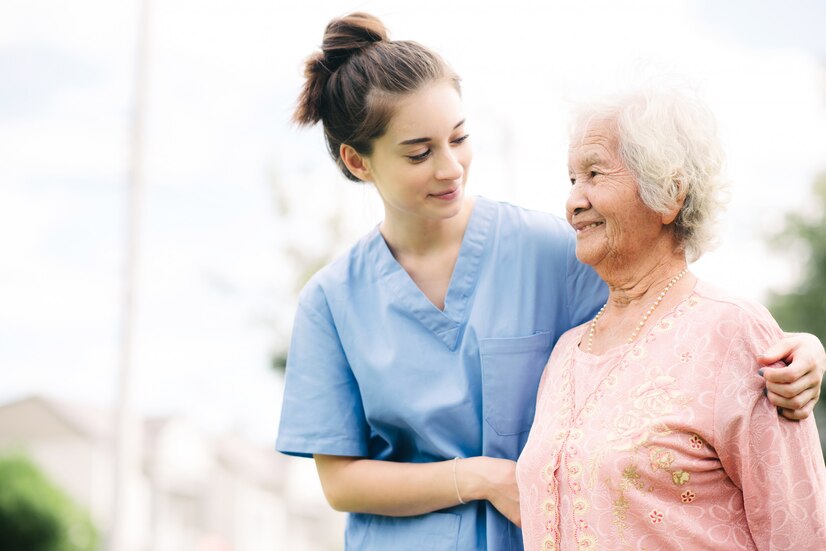 Premium Photo | Caregiver with asian elderly woman outdoor