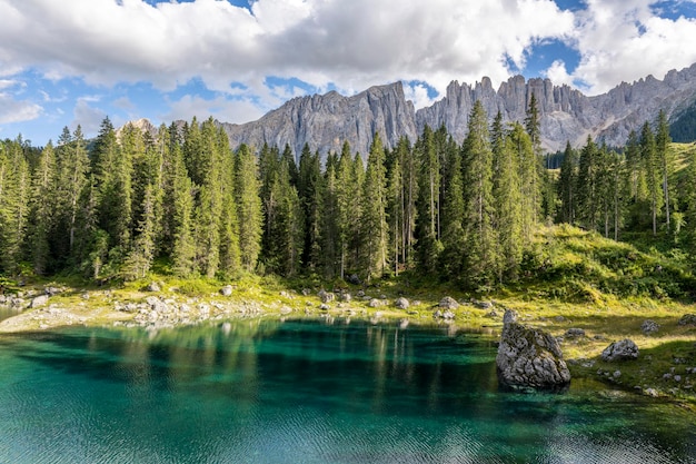 Carezza Lake on a sunny day with some cloud