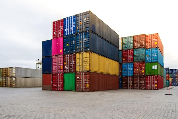 Cargo containers cargo container yard stack of freight\
containers at the docks industrial yard import and export logistic\
concept