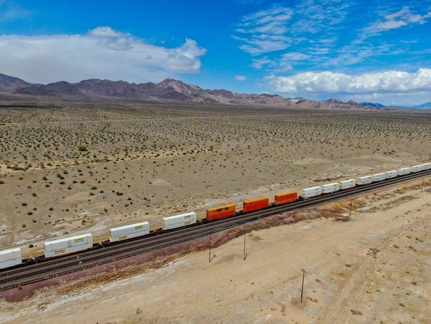 Cargo locomotive railroad engine crossing Arizona desert wilderness Arizona USA