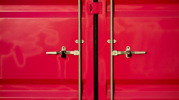 Cargo pink container for transportation with closed door.