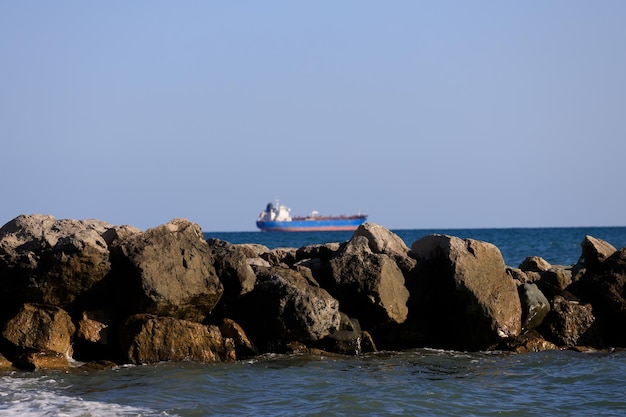 Cargo ship sails on the sea. High quality photo