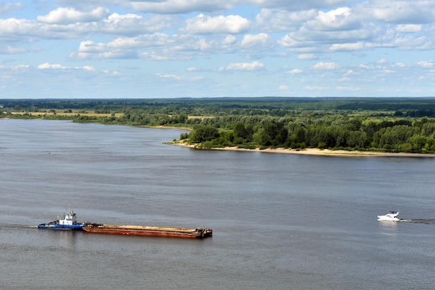 Cargo ship sails on the volga