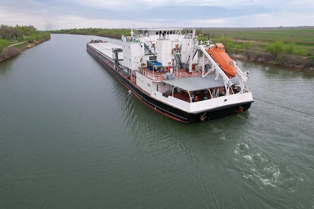 Cargo transportation Cargo ship on the river in Russia VolgaDon shipping canal in Volgograd Russia