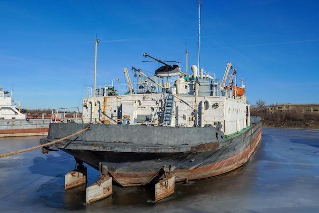 Cargo transportationcargo ship Winter layup of ships at the mouth of the Volga River in Volgograd