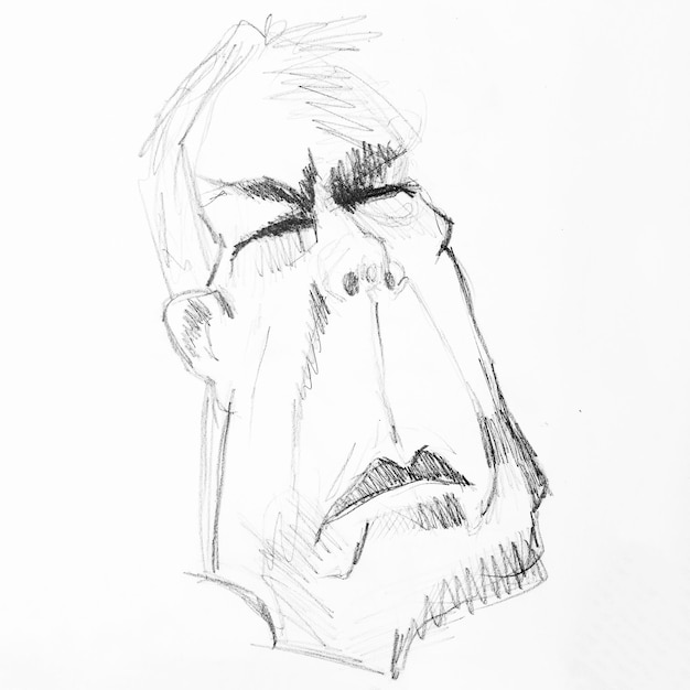 Photo caricature of old man drawing by hands with black pencil on white paper