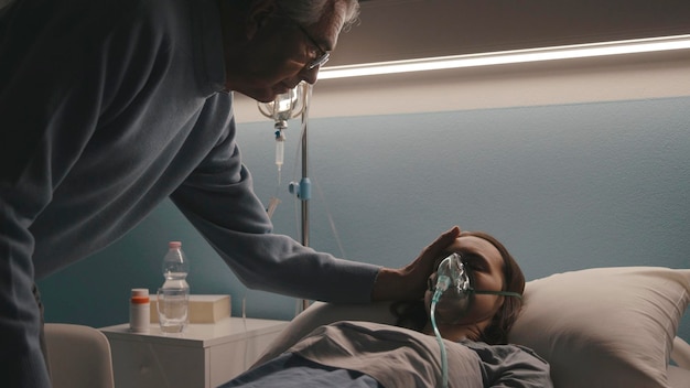 Caring father assisting her daughter at the hospital