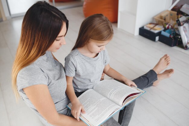 caring mum and daughter at home