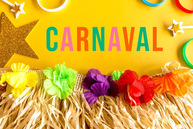 Photo carnival concept on yellow background, brazilian carnival. written 