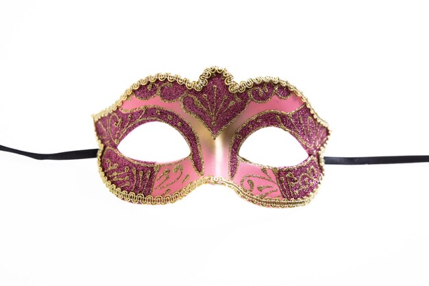 Photo carnival mask pink color ornate isolated on a white background