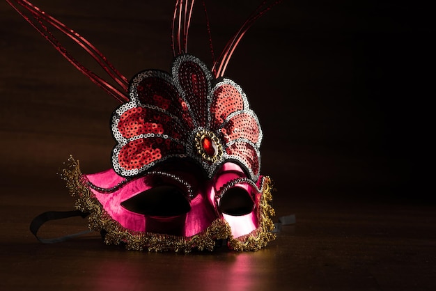 carnival masks beautiful venetian masks in detail on a table selective focus