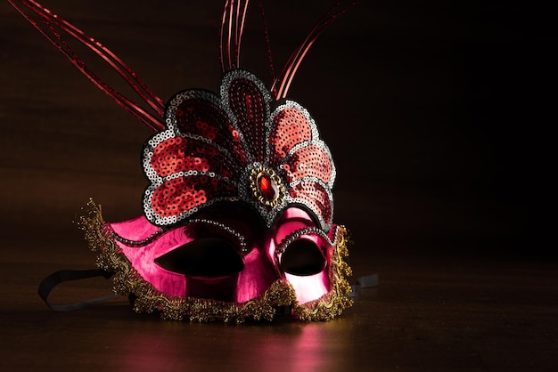 Carnival masks beautiful Venetian masks in detail on a table selective focus