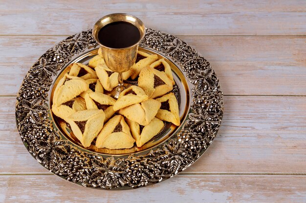 Carnival with hamantaschen cookies Purim jewish holiday