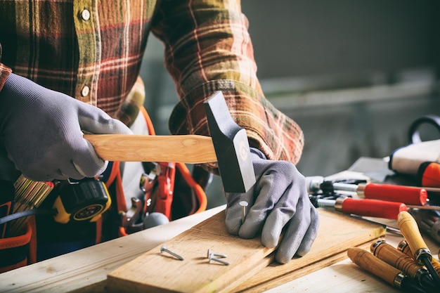 Carpenter holding a hammer