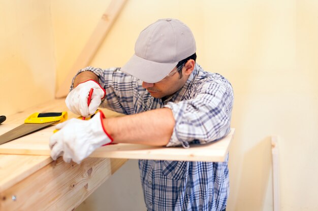 Carpenter at work in an apartment