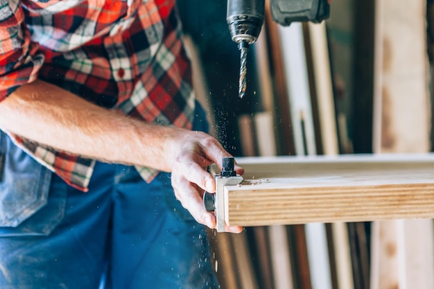 Carpenter at work in his workshop