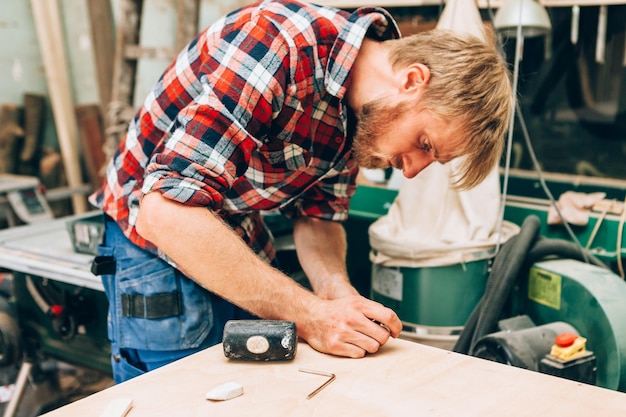 Carpenter at work in his workshop