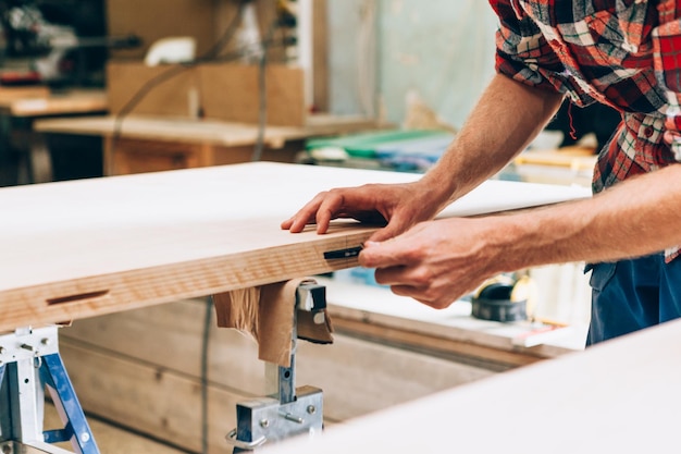 Carpenter at work in his workshop