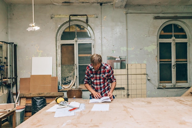 Carpenter at work in his workshop