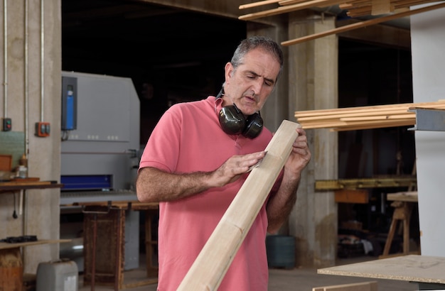 A carpenter working in his workshop