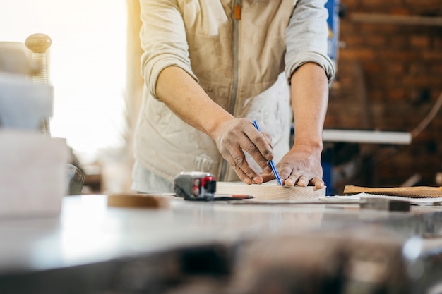 Carpenter works in the carpentry