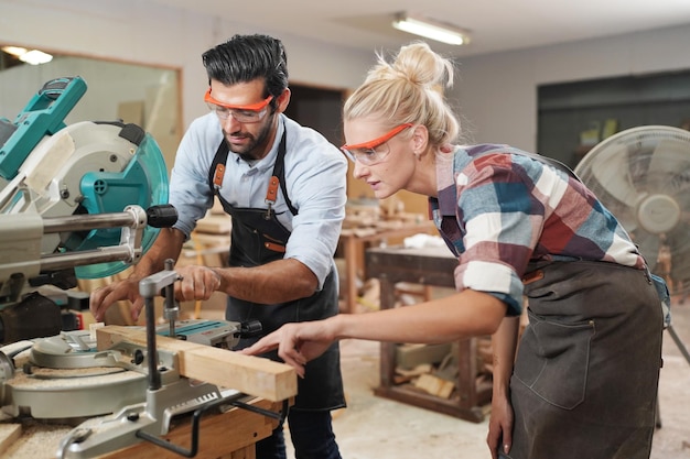 carpenters assembling furniture small business in wood diy workplace office background