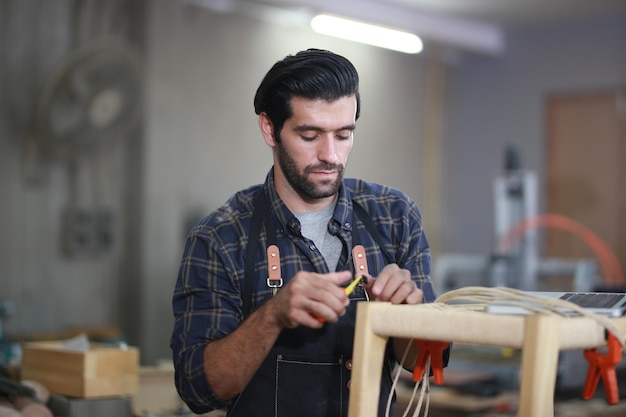 Carpenters Assembling Furniture small business workshop office background