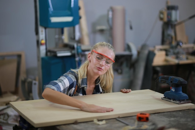 Carpenters Assembling Furniture small business workshop office background