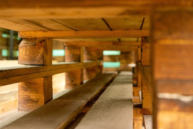 Carpentry made of rough wood perspective view from below