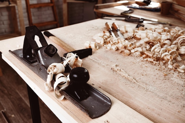 Photo carpentry plane tool for woodworking in workshop