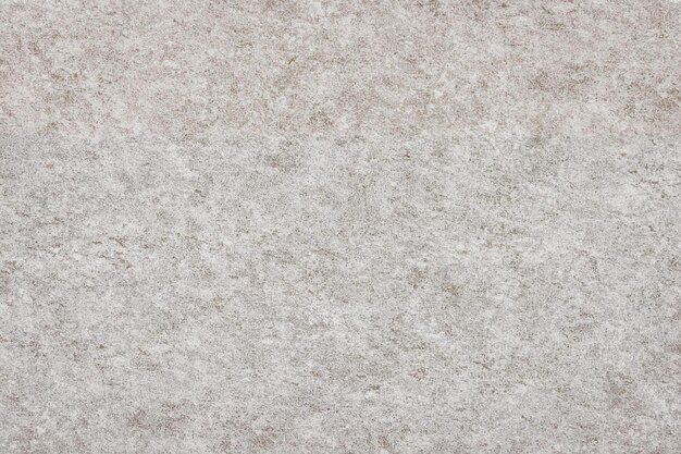 a carpet that is beige with a white background