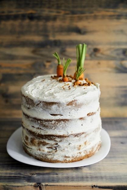 Carrot cake with fresh carrots decoration