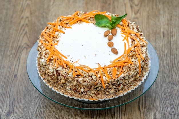 Carrot cake with nuts and cream