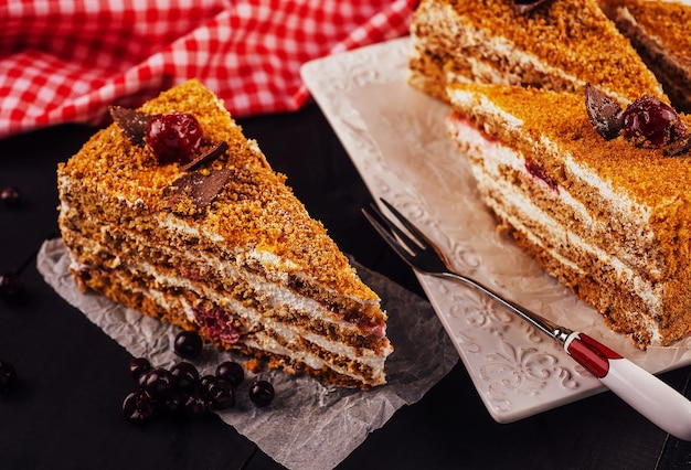 Carrot cake with walnuts and cherry