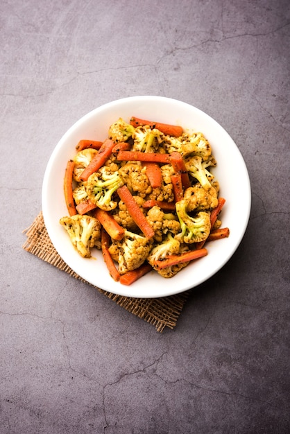 Carrot cauliflower achar made using PhoolGobi and Gajar. It's a sweet and sore seasonal pickle from India