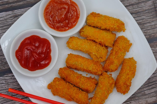 Carrot chicken nugget. nuggets are processed products from\
chicken, beef, fish. fast food. junk food