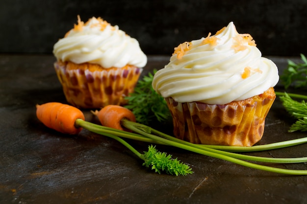 Carrot cupcakes with cream.